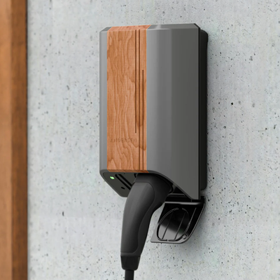 Andersen Quartz EV charger with wood front panel mounted on concrete wall
